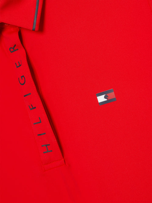 Tommy Hilfiger Equestrian® »Damen Poloshirt Harlem Rot, mit bedruckter Hilfiger Klappe und verdecktem Druckknopfverschluss. Mit aufgesticktem Flag Logo auf der linken Brust und aus einem schnell trocknenden, desodorierenden Material Artikelnummer TH13WSSP177-047 erhältlich bei www.Hotti24.de