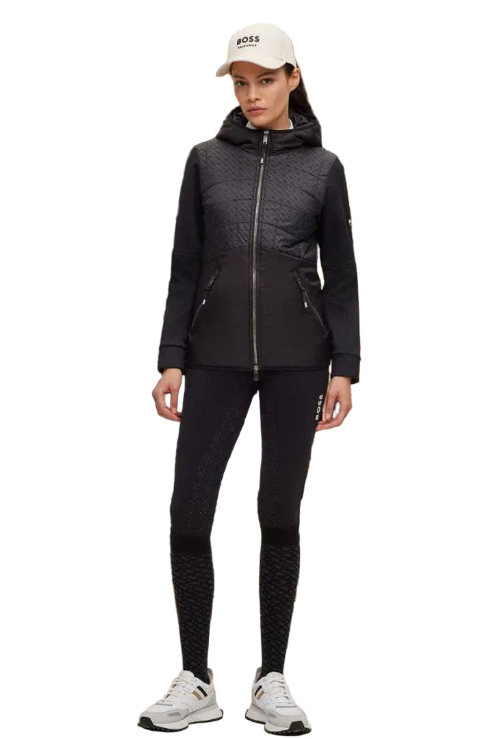 Die Datei beinhaltet Informationen über eine Damenjacke mit dem Namen "Bruna Performance" von der Marke BOSS. Die Jacke ist winddicht und wasserdicht. Die Artikelnummer lautet B1W1403-001, und die Jacke ist in der Farbe Schwarz erhältlich. Sie kann auf der Website www.hotti24.de erworben werden.