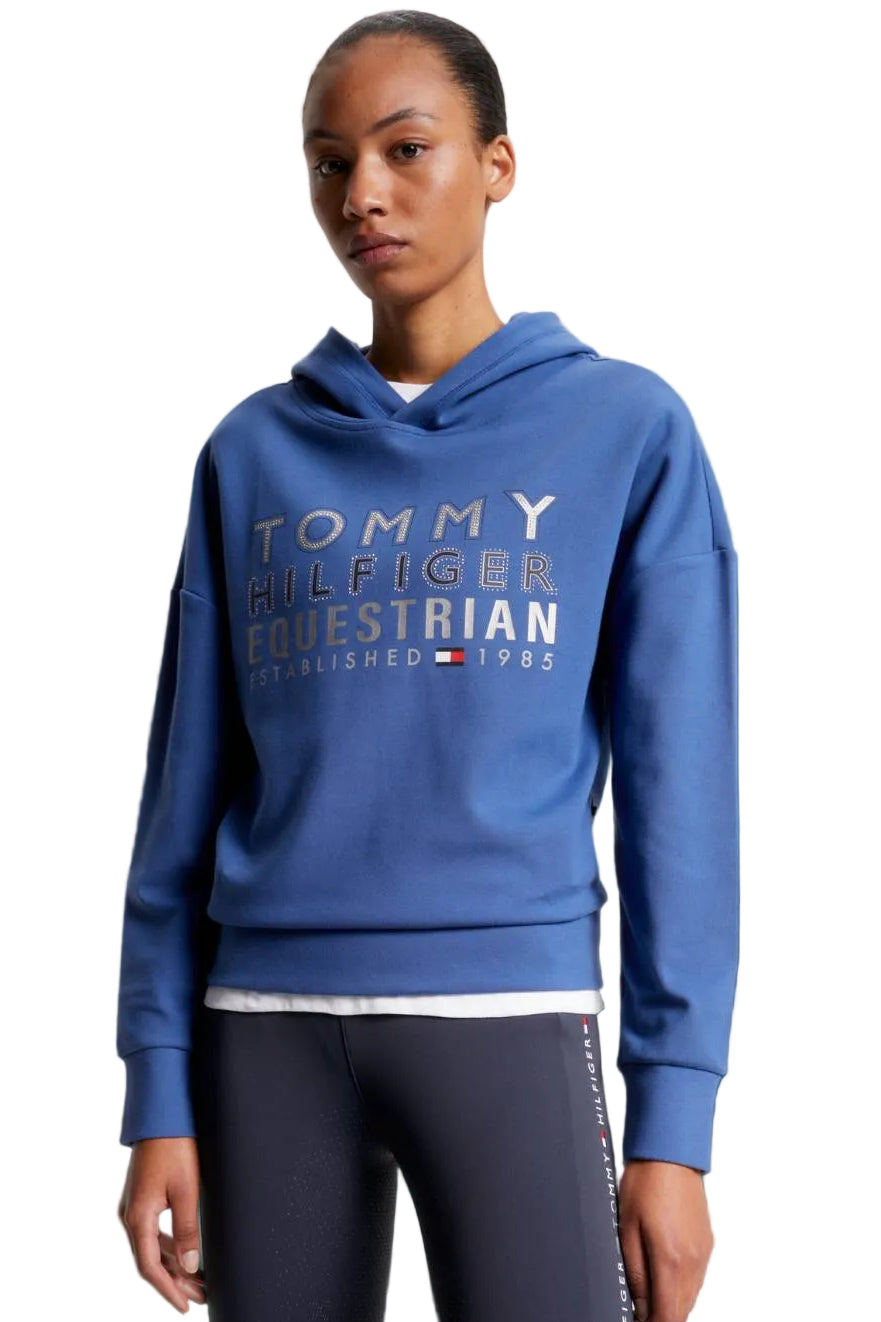 Damen-Hoodie von Tommy Hilfiger mit der Bezeichnung "Hoodie Paris TH08WHOO441-041" in der Farbe Blau. Dieser Hoodie ist auf der Webseite www.hotti24.de erhältlich. Er wurde speziell für Damen entworfen, um sowohl Stil als auch Komfort zu bieten. Zusätzlich sind in der Datei Bilder des Hoodies aus verschiedenen Blickwinkeln enthalten: von vorne, von der Seite und von hinten.