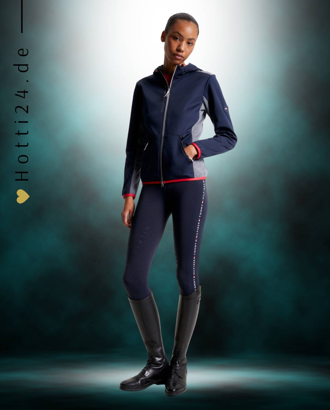 Damen-Jacke im Softshell-Stil von Tommy Hilfiger mit der Bezeichnung "Softshell Jacke London TH08WJAC451-004" in der Farbe Blau. Diese Softshell-Jacke ist auf der Webseite www.hotti24.de erhältlich. Sie wurde speziell für Damen entworfen, um sowohl Stil als auch Schutz vor den Elementen zu bieten. Zusätzlich sind in der Datei Bilder der Softshell-Jacke aus verschiedenen Blickwinkeln enthalten: von vorne, von der Seite und von hinten.