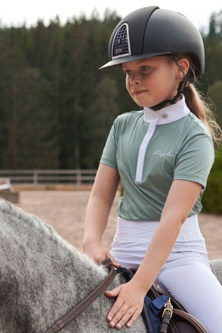 kingsland-kinder-turniershirt-klpimrose-2220222464-6446-green-kaufen-www.hotti24.de - mit pferd