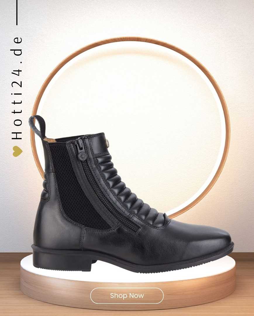 Reitstiefelette 'Legacy SZ Milano Schwarz 101504101033' von SUEDWIND, verfügbar auf der Website www.Hotti24.de: Die Stiefelette ist in der Farbe Schwarz erhältlich und trägt die Artikelnummer 101504101033. Sie ist von der Marke SUEDWIND und könnte für Reitsportaktivitäten gedacht sein. Die genaue Beschreibung der Eigenschaften, Materialien und weiteren Details der Stiefelette kann auf der Website www.Hotti24.de gefunden werden.
