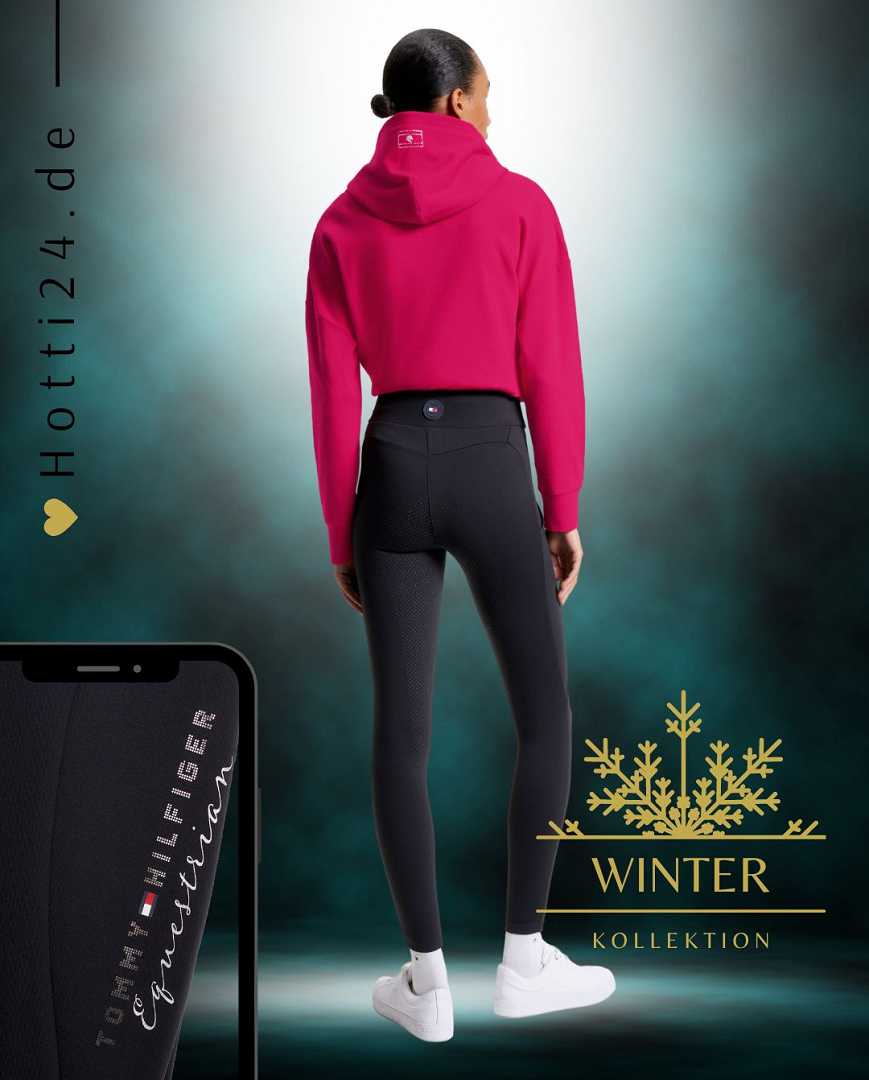 Damen-Reitleggings von Tommy Hilfiger mit der Bezeichnung "Monaco Fullgrip TH08WFLE463-003" in der Farbe Schwarz. Diese Reitleggings sind auf der Webseite www.hotti24.de erhältlich. Sie wurden speziell für Damen entworfen und verfügen über Fullgrip-Elemente, die zusätzlichen Halt während des Reitens bieten sollen.  Zusätzlich sind in der Datei Bilder der Reitleggings aus verschiedenen Blickwinkeln enthalten: von vorne, von der Seite und von hinten